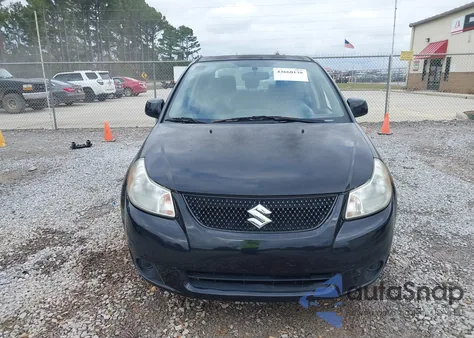 2013 Suzuki Sx4 Le/Le Popular z USA, uszkodzony, nr VIN JS2YC5A31D6102366